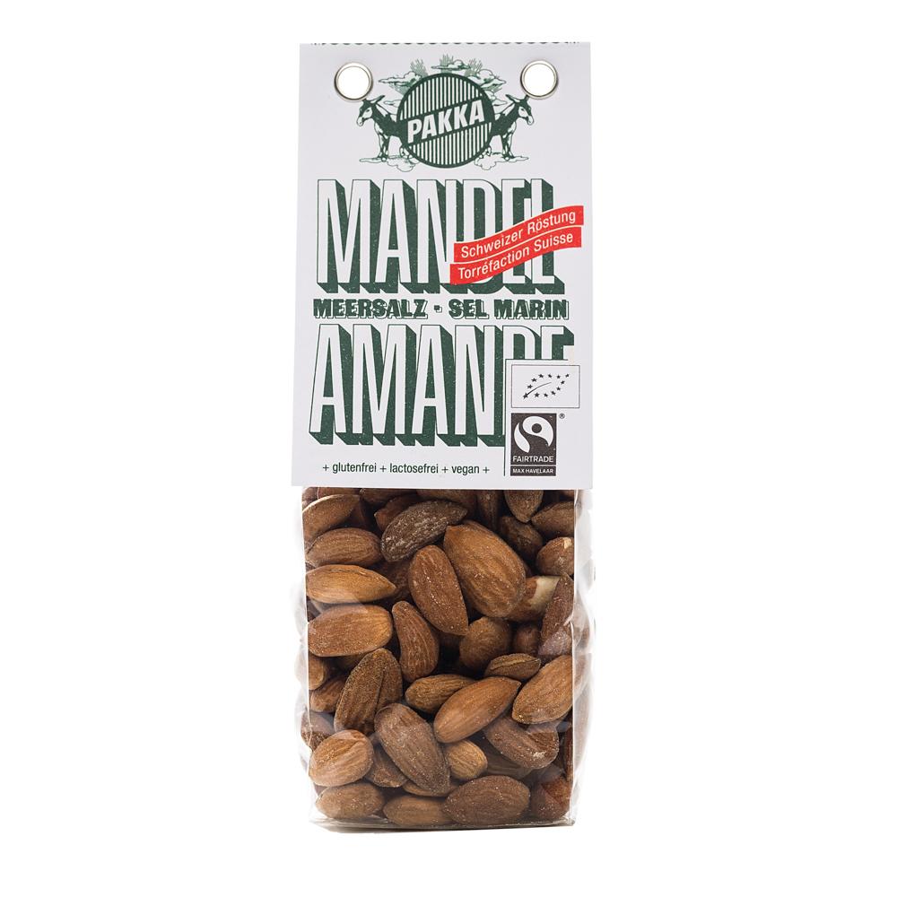 Mandeln geröstet mit Meersalz, bio & fair, 100g Les amandes à la peau couleur cannelle proviennent de Pakistan. Au printemps, le doux parfum des fleurs d'amandiers éveille l'envie de croquer dans ces amandes à l'arôme puissant. En automne vient le temps de la récolte. Séchées au soleil, elles sont ensuite délicatement grillées à sec sans ajout d'huile.+ biologiques & équitables+ sans gluten+ sans lactose+ vegan