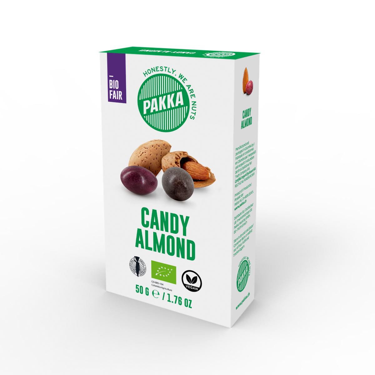 Schoko-Mandeln im Zuckermantel, bio und fair, 50g Les amandes biologiques de première qualité Pakka sont enrobées de chocolat biologique Equiori, qui est fabriqué à partir de cacao colombien sélectionné, puis terminées avec une délicate couche de sucre coloré.