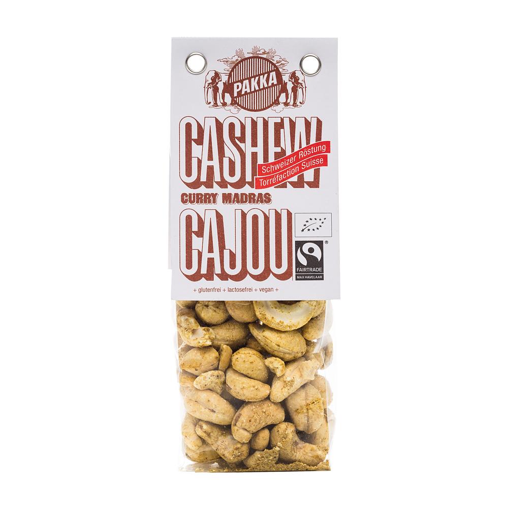 Cashew geröstet mit Curry Madras, bio & fair, 100g Les noix de cajou sont cultivées en Inde. Elles sont appréciées pour leur goût très fin et doux ainsi que pour les précieuses substances nutritives qu'elles fournissent au corps comme à l'esprit. Un excellent mélange de Curry de Madras se compose de 30 épices au moins qui se répondent et s'assemblent parfaitement. Grâce à elles, nos noix de cajou se teintent d'une saveur exotique.+ biologiques & équitables+ sans gluten+ sans lactose+ vegan